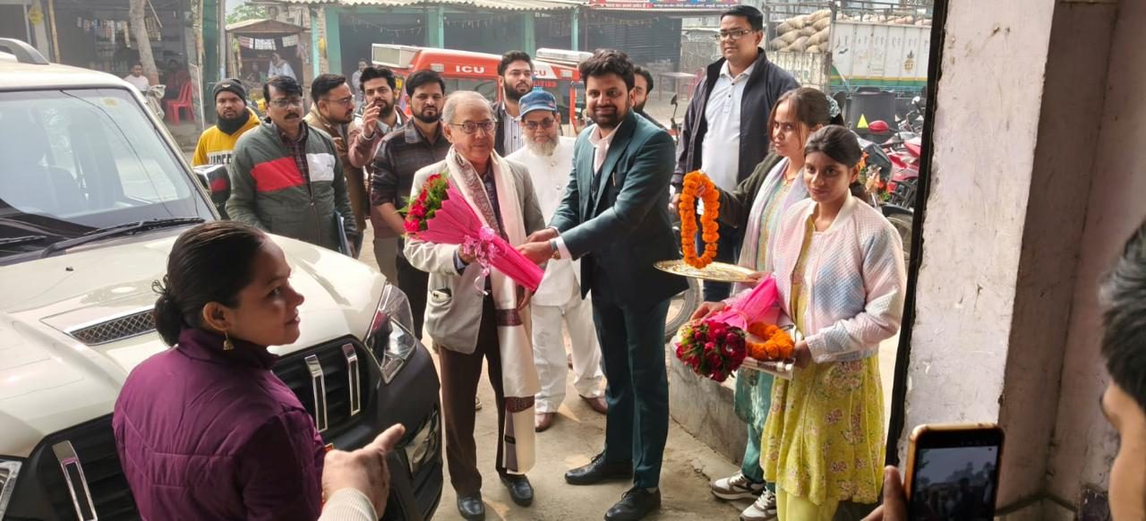 The Civil Surgeon being welcomed with flowers on arrival