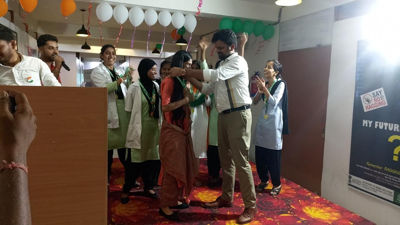 A student receiving a medal