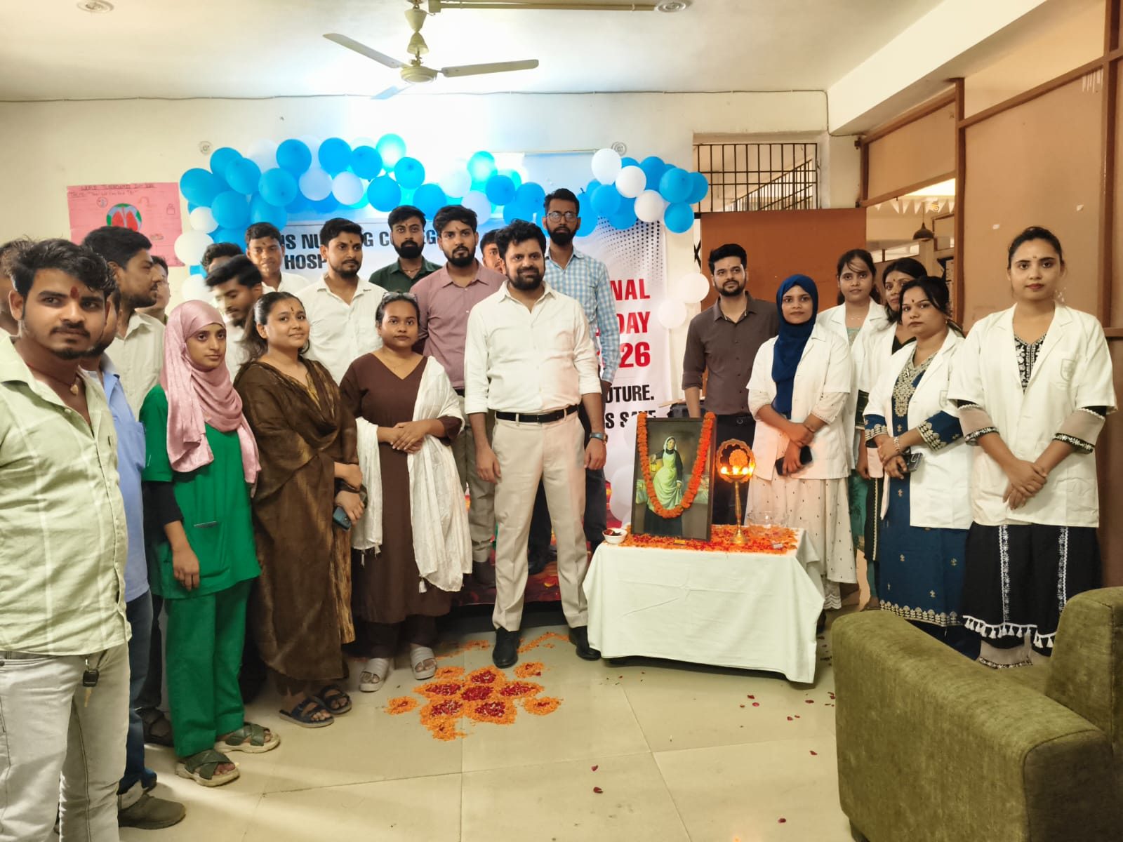 Group photo beside the tribute to Florence Nightingale