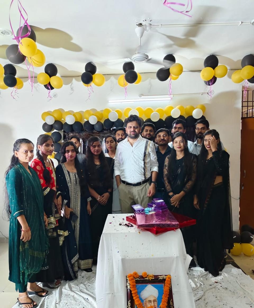 Students gathered around the floral tribute to Dr Sarvepalli Radhakrishnan